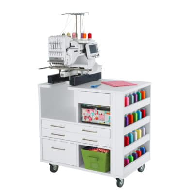 White Ava Embroidery Cabinet (9301J) from Kangaroo Sewing Furniture with embroidery machine and colorful accessories
